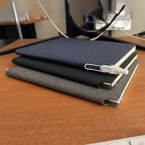 A5 Notebook Soft leather cover, colors: blue, black & grey Special daily organizing design that is printed on the internal sheets.